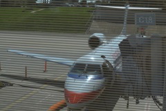 Pardon the lines but that's an American Eagle ERJ-135...