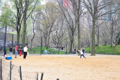 New Yorkers improvising baseball...