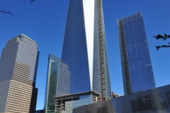 One World Trade rising above the 9/11 Memorial...
