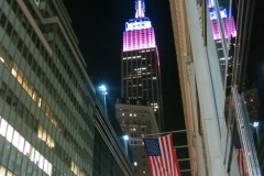 Empire State Building glowing pink at the top...