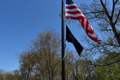 US and POW flags honouring all branches of the service