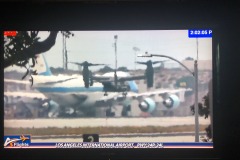 V-22 Ospreys flying escort for Marine One lifting off