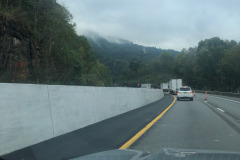 Heading down a steep grade but still can admire the clouds obscuring the tops of the mountains... Heading down a steep grade but still can admire the clouds obscuring the tops of the mountains...