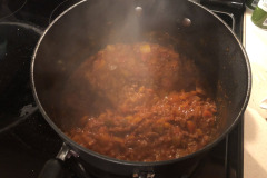 Drop the browned ground beef into the pot and let it simmer a bit to help infuse the flavour of the sauce. Drop the browned ground beef into the pot and let it simmer a bit to help infuse the flavour of the sauce.