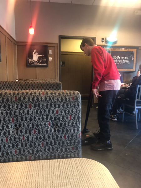 Alex doing a bit of tidying round the tables...