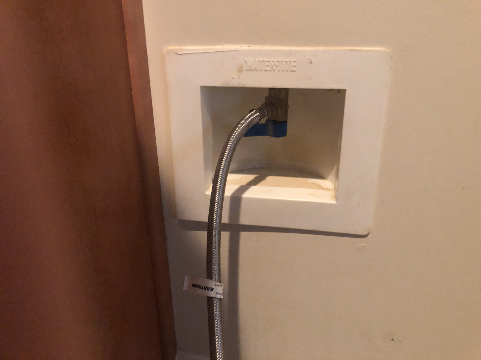This is how the technician left the old refrigerator after abandoning the installation. Notice the blue colour showing for the valve handle which is *ON*. This is how the technician left the old refrigerator after abandoning the installation. Notice the blue colour showing for the valve handle which is *ON*.
