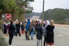 The monks have crested the hill...